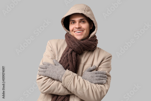 Young man in stylish puffer...