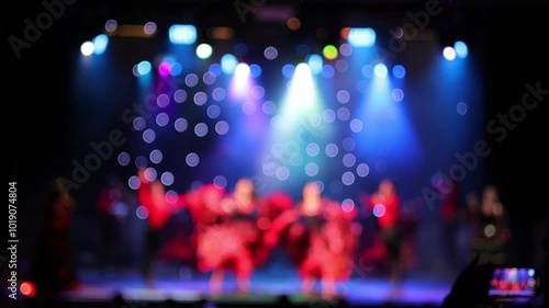 Wallpaper Mural Texture blur and defocus, background for design. Stage light at a concert show. Artists perform on scene in light and smoke. Torontodigital.ca