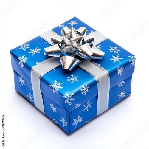 A beautifully wrapped blue gift box with silver ribbon and snowflake patterns. Perfect for holidays or celebrations. Add a touch of joy to any occasion. AI photo