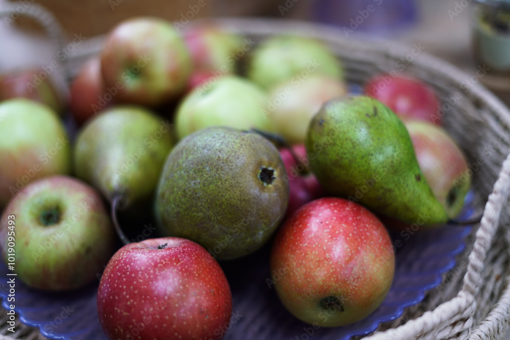 Fresh pears in a wicker basket. Close up Fresh pears in a wicker basket. Close up
