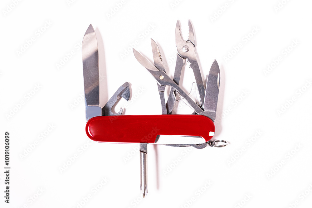 Popular multifunctional folding Swiss knife on a white background. Popular multifunctional folding Swiss knife on a white background.