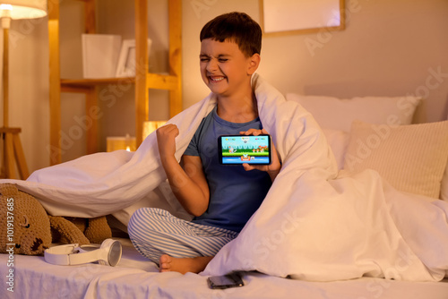 Cute happy little boy with ...