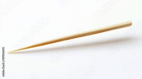 The toothpick which is always prepared and used after a meal is finished is made of wood and has a sharp tip