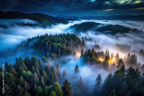 Aerial view of dark forest on Mount Cucco at night with fog in Umbria photo