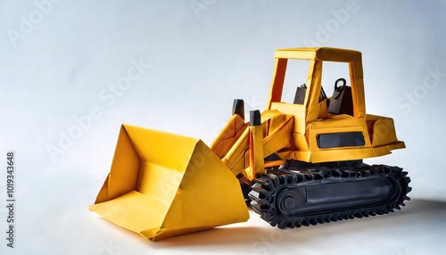 paper origami concept of a bulldozer, dozer or crawler, a large, motorized machine equipped with a metal blade to the front for pushing material like soil, sand, snow, rubble, or rock. Isolated white