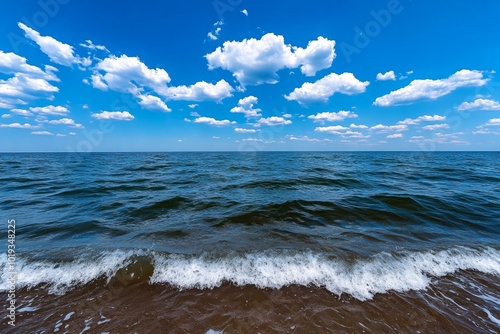 A peaceful ocean scene with the horizon blending seamlessly into the sky, representing the idea of monism where boundaries between elements dissolve photo