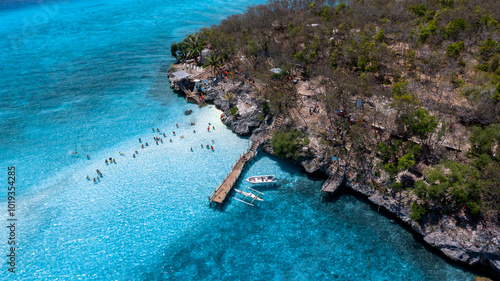 Aerial view of Sumilon Island, Oslob, Cebu, Philippines, White sand beach and seashore at Sumilon island beach, Sand beach clear sea water of the Sumilon Island, Oslob, Cebu, Philippines. photo