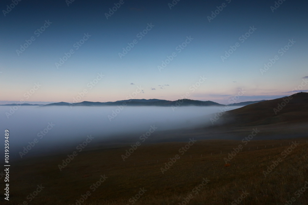 Sea of clouds in late autumn, Inner Mongolia, China Sea of clouds in late autumn, Inner Mongolia, China