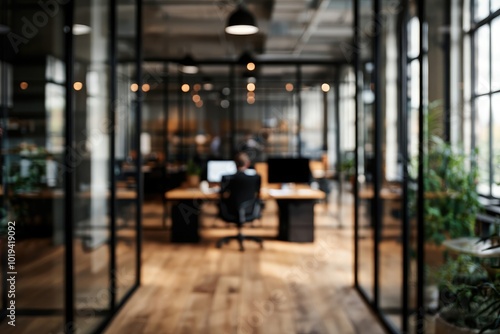 Blurred Office Scene Behind Glass Walls