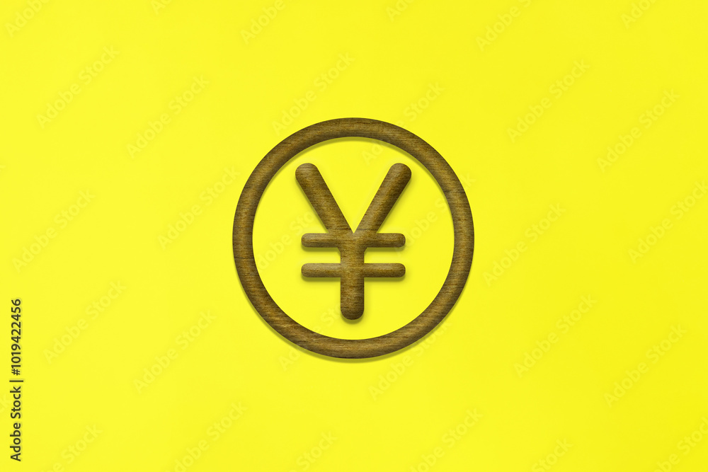 Fototapeta premium 茶色いお金の円マークの木製アイコンが中心にある黄色い背景