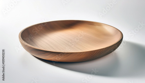 Elegant, handcrafted wooden bowl; smooth, light wood grain; minimalist design; perfect for serving or display. Adds rustic charm to any setting. photo