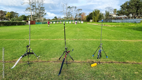 Bows standing on an outdoor archery range