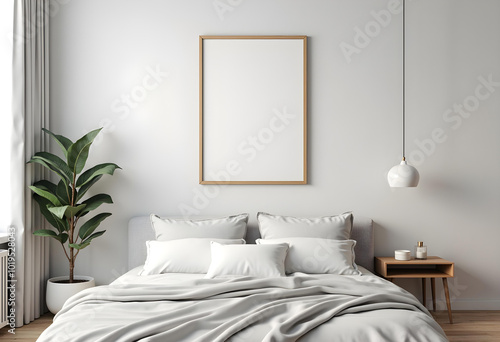 serene bedroom featuring cozy bed with soft gray bedding, stylish nightstand, and decorative plant. minimalist design creates calming atmosphere perfect for relaxation photo