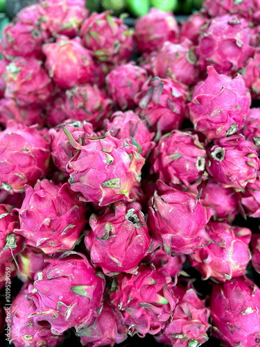 Stacked of Fresh Dragon Fruit at Supermarket