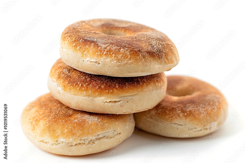 Pile English muffin wheat isolated on white background. 3D rendering. Pile English muffin wheat isolated on white background. 3D rendering.