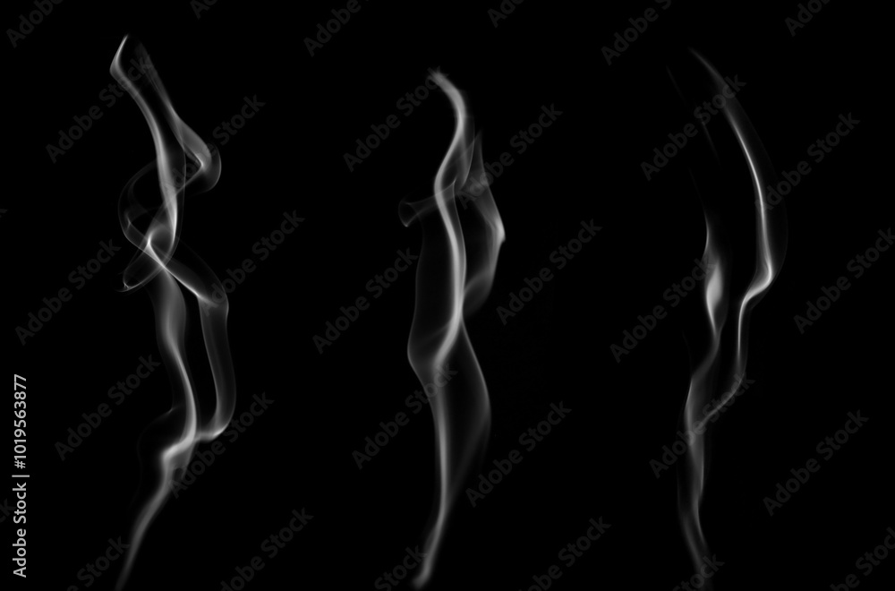 Isolated white fog or smoke effect on black background. White clouds. Fog or smoke background. Vapor. Illustration showing various textures and densities of smoke. Isolated white fog or smoke effect on black background. White clouds. Fog or smoke background. Vapor. Illustration showing various textures and densities of smoke.