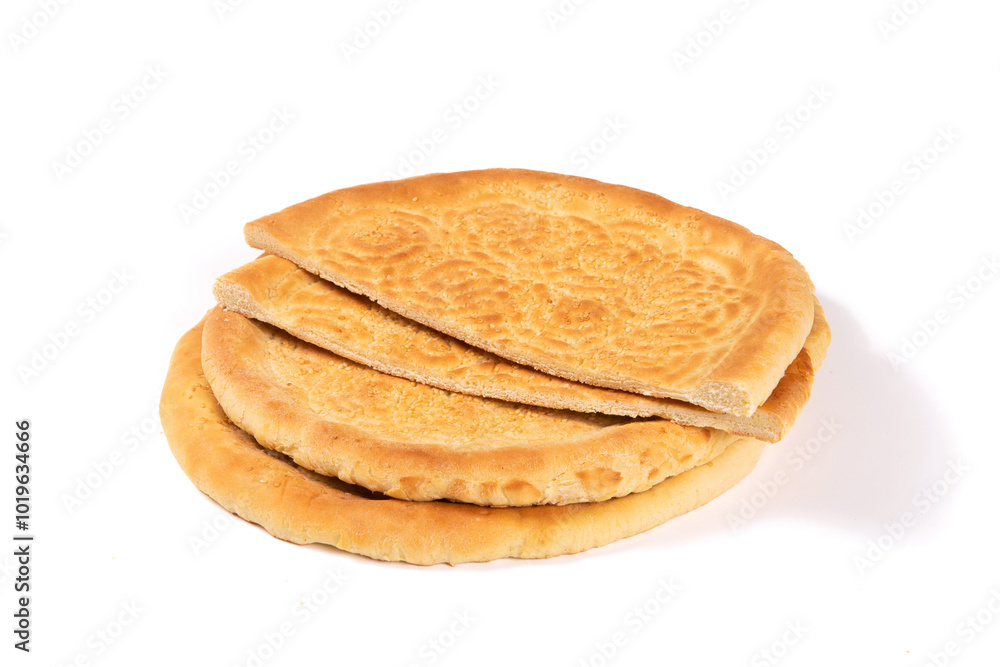 naan bread isolated on white background. Traditional food in Xinjiang, China naan bread isolated on white background. Traditional food in Xinjiang, China