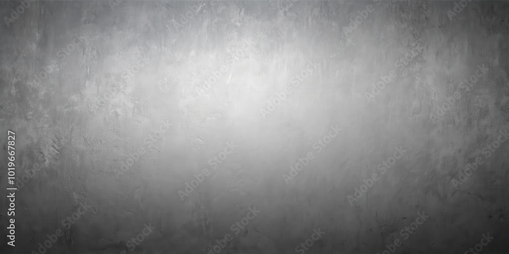 A subtle gradient from dark to light gray on a textured concrete surface.  This abstract background offers a versatile backdrop for design and presentation.