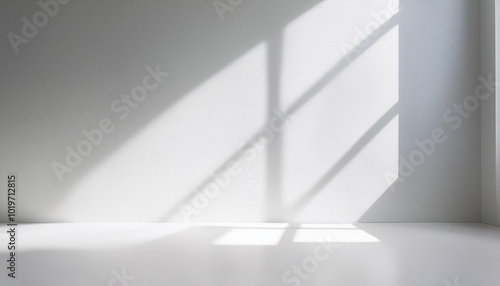Fototapeta Naklejka Na Ścianę i Meble -  Abstract white studio room with light and shadow from window background for product display presentation