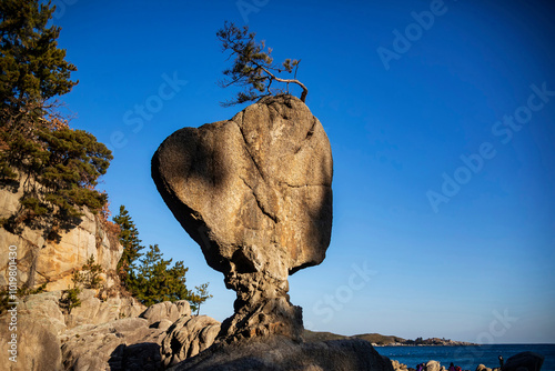 Seo Nang Rock at Songjiho Beach near Goseong-gun, Gangwon-do, Korea. Seo Nang means guardian deity of land and village which protects well-being and abundance of village. photo