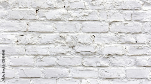 White brick wall with rough texture and visible wear, symbolizing raw materials and simplicity. Concept of urban architecture and background design.