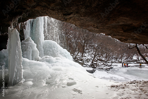 Yeonpung-myeon, Goesan-gun, Chungcheongbuk-do, Korea - January 12, 2013: Ice wall and icicles of the Suok Waterfall at Joryeongsan Mt.  photo