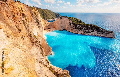 Zakynthos, Greece. Navagio Beach with wrecked ship in Ionian Sea. Beautiful views of azure sea water and nature with cliffs cave.