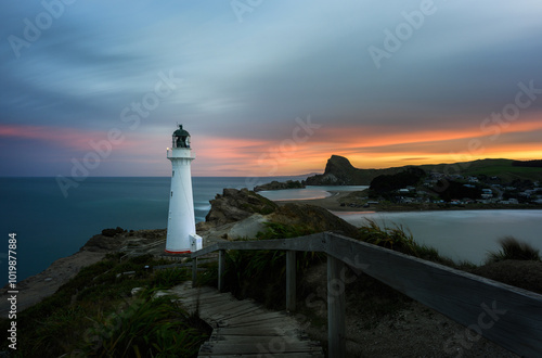 Obraz na płótnie Castlepoint lighthouse and Castle Rock at sunset. Wairarapa. New Zealand. w salonie