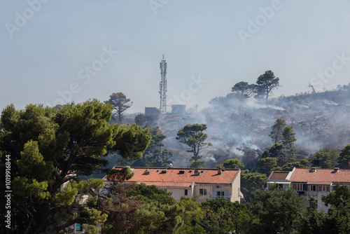 Fire disaster over the town photo