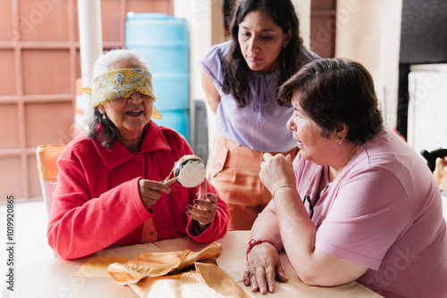 Grandparents doing didactic activities in a retirement home.