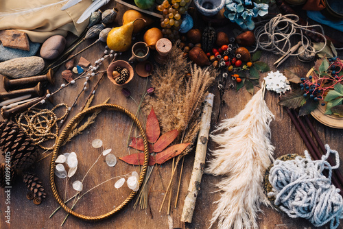 Natural elements and decorative items on rustic tabletop