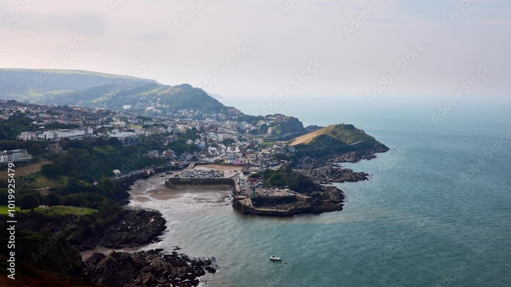 Ilfracombe, distant timelapse of the coastal town from Hillsborough hill. Devon, England, UK Ilfracombe, distant timelapse of the coastal town from Hillsborough hill. Devon, England, UK