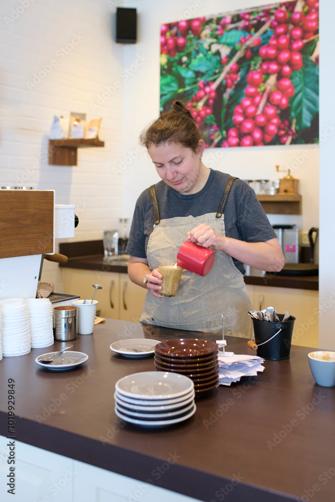 © Rowena Naylor/Stocksy - Small business owner and Barista Serving Coffee in a Cozy Café © Rowena Naylor/Stocksy - Small business owner and Barista Serving Coffee in a Cozy Café