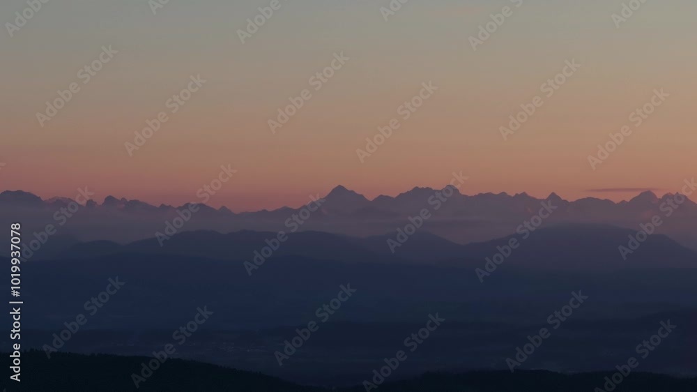 orange red sky sunset with mountains in the background orange red sky sunset with mountains in the background