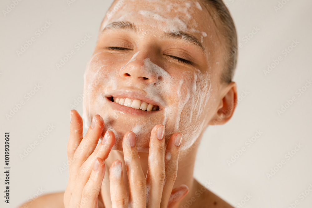 © Asya Molochkova/Stocksy - Washing face with soap beauty product © Asya Molochkova/Stocksy - Washing face with soap beauty product