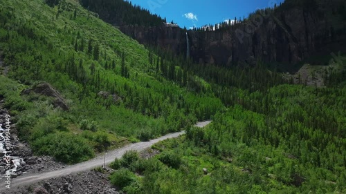 Telluride Bridal Veil Falls aerial drone Waterfall Telluride Black Bear Pass Road Colorado powerplant windy mist spray Ouray Ridgway Box Canyon cliffside 4wd hiking cloudy sun blue sky forward upwards photo