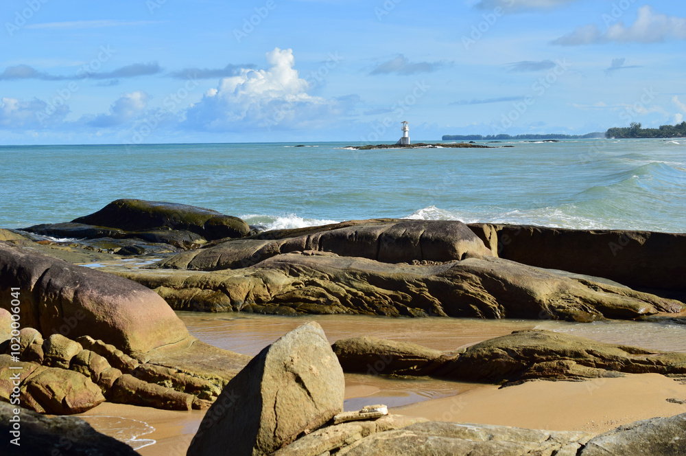 The coast of the Andaman Sea. Boulders and a sandy beach. Khao Lak. Thailand. The coast of the Andaman Sea. Boulders and a sandy beach. Khao Lak. Thailand.