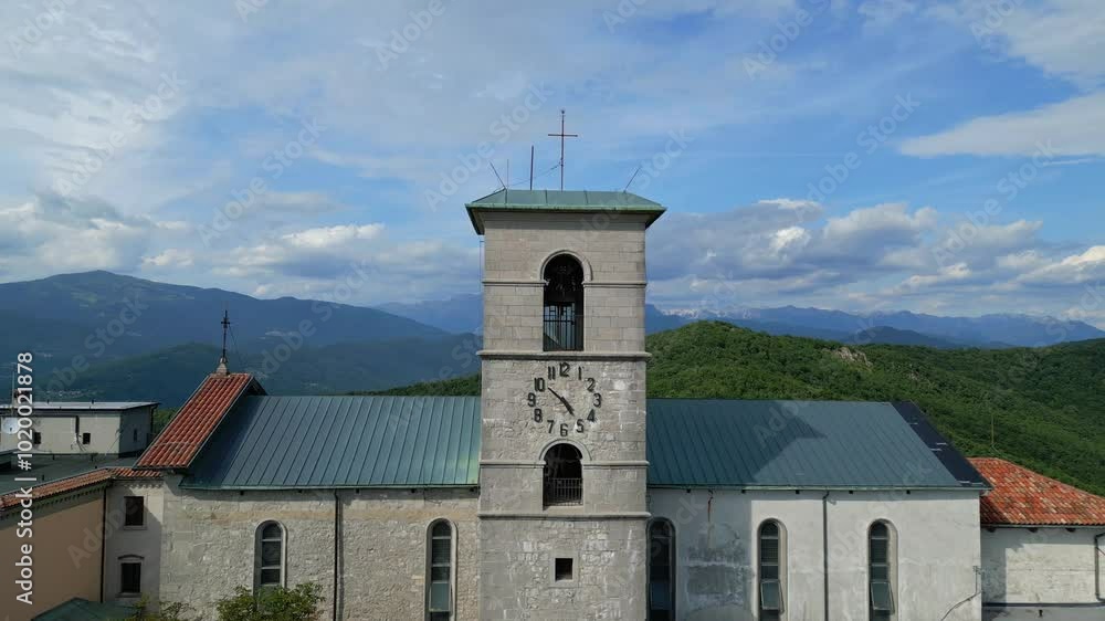 Isolated among the mountains and woods. Ancient Marian sanctuary of Castelmonte. Fortified village as a bastion of faith. Isolated among the mountains and woods. Ancient Marian sanctuary of Castelmonte. Fortified village as a bastion of faith.