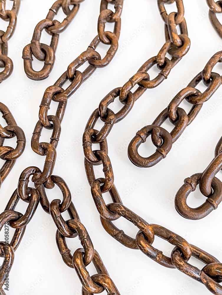 Artfully arranged metallic chain links on a light backdrop highlight their textured strength and versatility. Artfully arranged metallic chain links on a light backdrop highlight their textured strength and versatility.