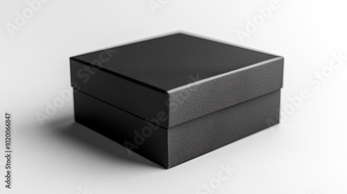 A sleek black box on a white background, suggesting elegance and mystery.