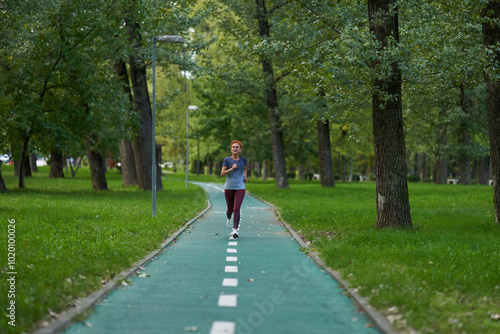 Wallpaper Mural Woman running in park Torontodigital.ca