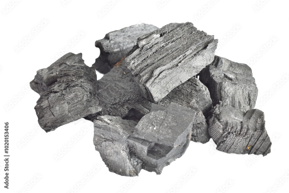 Fototapeta premium A pile of grill charcoal lies on a PNG background.