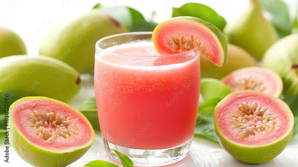 Refreshing guava juice in a glass, surrounded by fresh guavas and green leaves, showcasing vibrant colors and natural freshness. Refreshing guava juice in a glass, surrounded by fresh guavas and green leaves, showcasing vibrant colors and natural freshness.