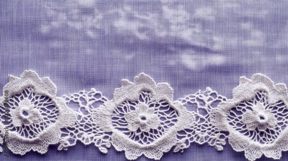 Obraz premium White Lace Trim on Purple Gridded Fabric