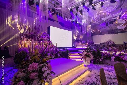 luxury color theme wedding solemnisation dinner flower florist , dinnerware banquet, cloth and stage lighting decoration design in premium hotel ballroom and beautiful beach event