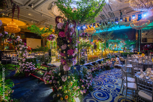 luxury color theme wedding solemnisation dinner flower florist , dinnerware banquet, cloth and stage lighting decoration design in premium hotel ballroom and beautiful beach event