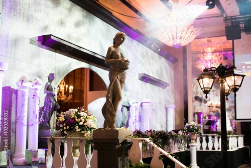 luxury color theme wedding solemnisation dinner flower florist , dinnerware banquet, cloth and stage lighting decoration design in premium hotel ballroom and beautiful beach event photo