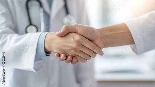 2410_021.smiling female doctor in white coat shaking hands with patient, bright medical office, stethoscope around neck, desk with paperwork, soft natural lighting, professional medical photography