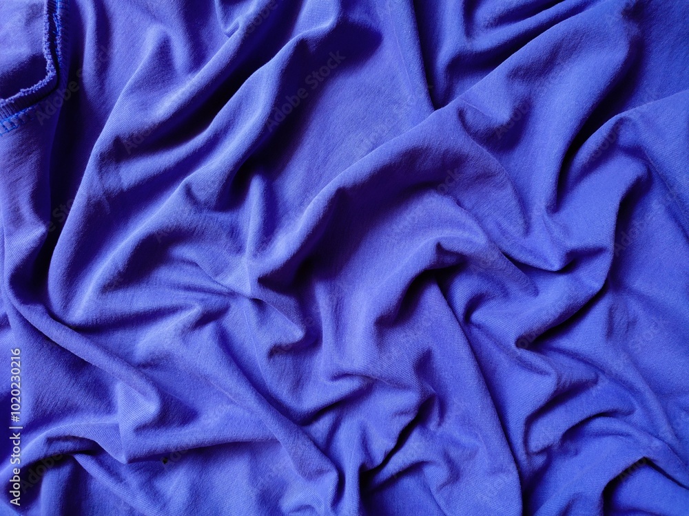 The texture and background of the fabric is blue The texture and background of the fabric is blue