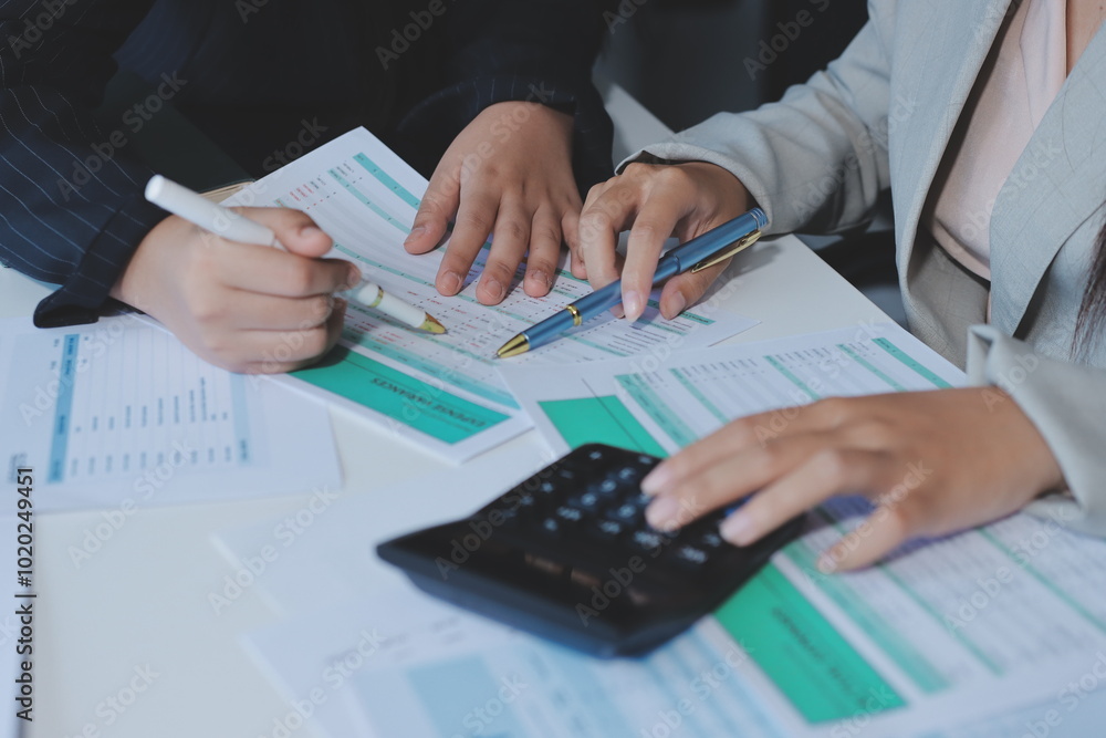 Team of business people are meeting to analyze data for marketing plan,Market research reports and income statistics, Financial and Accounting concept. Team of business people are meeting to analyze data for marketing plan,Market research reports and income statistics, Financial and Accounting concept.